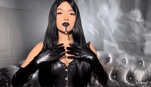 Black hair,leather gloves and black cigarette – Angie